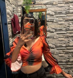Orange puff full sleeves top for women