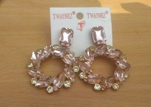 Pink Crystal Embedded Hoop Earrings