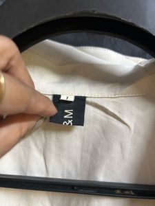 Ruffled Button-Down Shirt