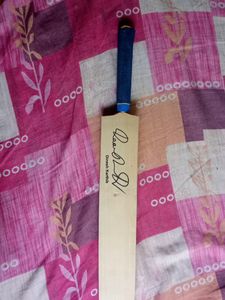 Cricket Bat With A Signature Of Dinesh Karthik