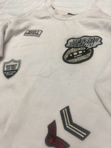White Sweatshirt With Stickers