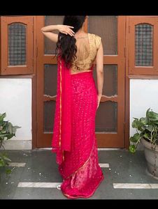 Pink Saree with Gold Blouse