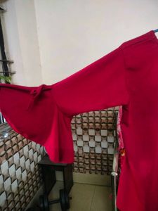 Red bell sleeve top