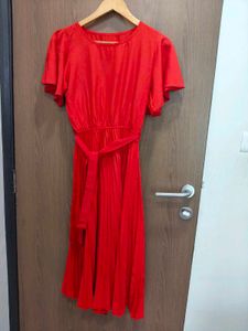 Red Frock With Black Accessories