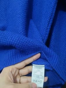 Branded Almost new -Blue Self design Sweater.