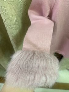 Pink Sweater with Fur Cuffs