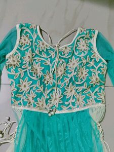 Beautiful sea green gown frock for women.