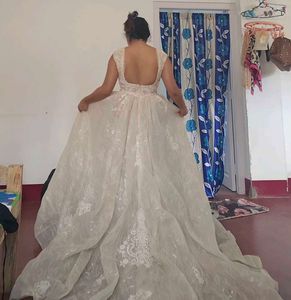 Cream wedding gown with pocket