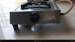 Old Gas Stove With Pipe