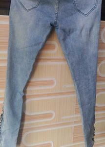 Distressed Denim Jeans