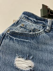 Ripped Knee Jeans