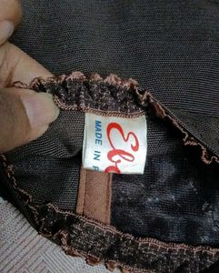brown corset top.