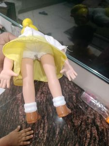 Vintage Blonde Doll with Bow