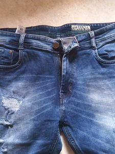 Distressed Denim Jeans