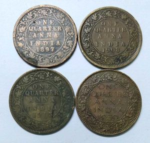 One Quarter Anna 4 coins from different monarchs
