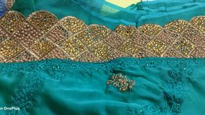 Elegant Teal Embroidered Saree