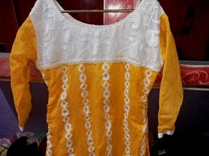 yellow dress with nice white design