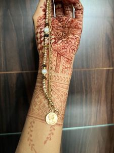 Layered Gold Bracelet With Charm