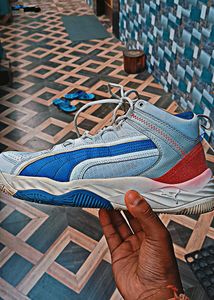 PUMA REBOUND FUTURE EVO UNISEX MID TOP SNEAKER