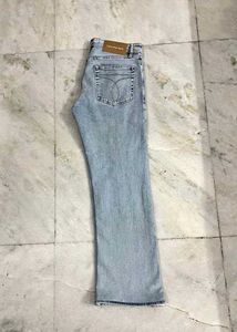 CALVIN KLIEN ICE WASHED BLUE BOOTCUT JEANS 32