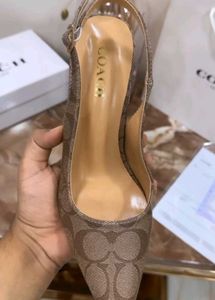 Coach Heels