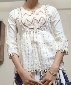 White Embroidered Pom Po