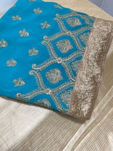 Heavy embroidery sea green saree