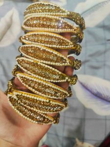 Elegant Gold & Pearl Bangles (Set of 8)
