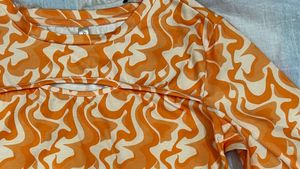Orange Swirl Long Sleeve Crop Top