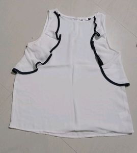 Sleeveless white short top