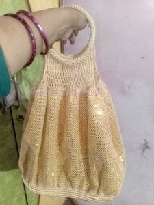 Golden Sequence Pottly Beg👝
