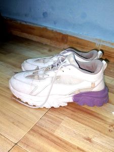 Stylish White Chunky Sneakers with Purple Sole