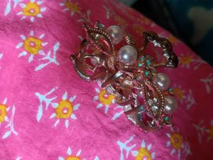 Cute butterfly earings and heavy clutch combo