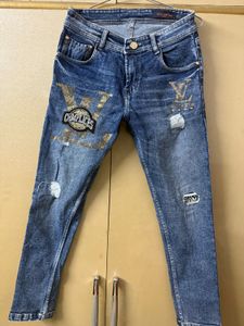 Louis Vuitton Embellished Jeans