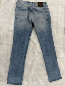 Distressed Denim Jeans