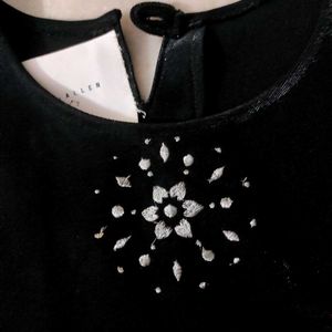 Black Sleeveless Top with Rhinestone Detail