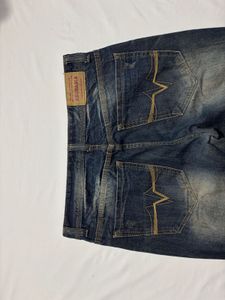 Distressed Denim Jeans