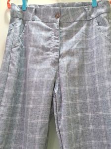 girls grey plaid pants (size 28-29)