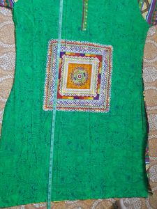 Beautiful Rayon kurti...front is green and back is multicoloured...totally new ...no flaws....not used single time...three quarters sleeves...side cut