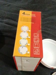 Brand new four piece Stackable  bowl