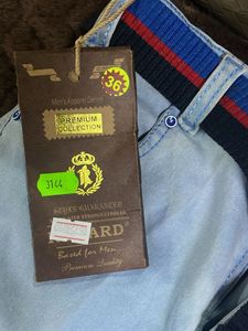 Light Wash Jeans with Striped Belt