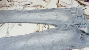 Distressed Gray Denim Jeans
