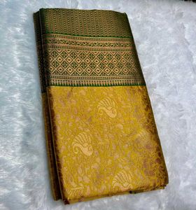 Elegant Yellow banarasi Saree With Running Blouse