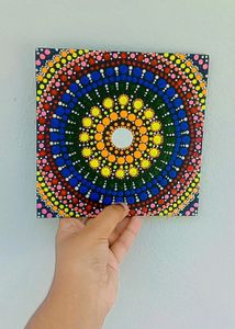 Its a handmade mandala art or dot art