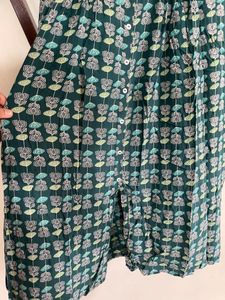 Green Sleeveless Side And Front Cut Kurti