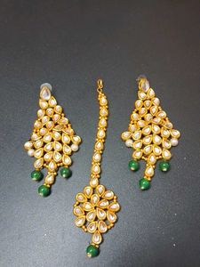 Green Pearled Kundan Earrings And Mangtika