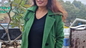 Green woollen overcoat