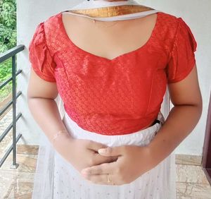 White Net Lehanga And Red Prince Cut Blouse