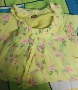 A flowing beautiful Yellow Color western dress