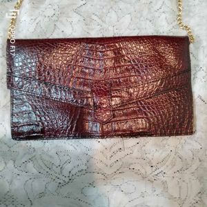 maroon vintage leather snakeprint bag